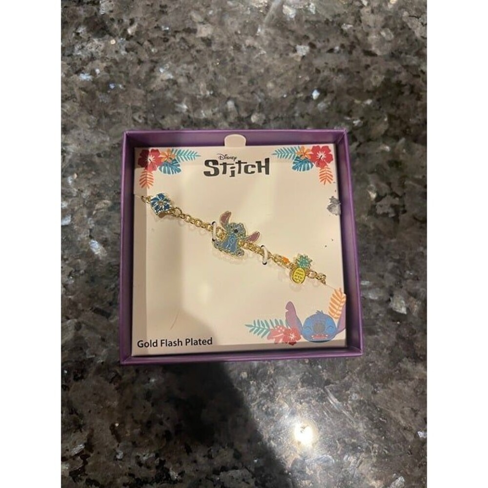 Disney Women’s Stitch Bracelet. Licensed gold Flash-Plated Fashion Jewelry